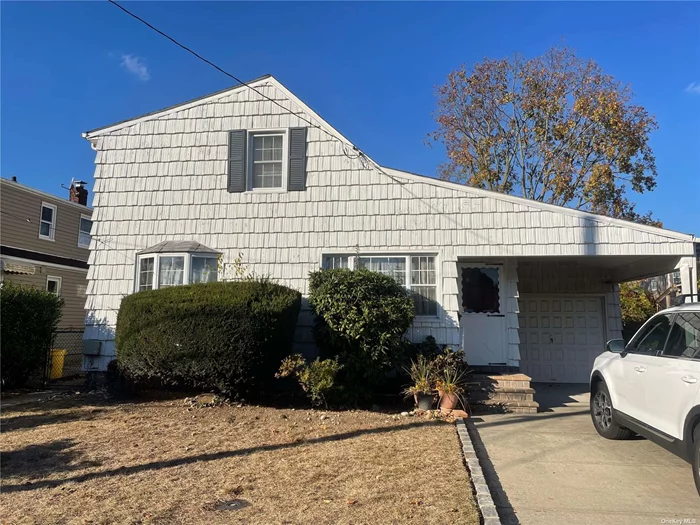 Charming Cape on a quiet Dead End Street. Full Basement. Attached Garage. New Boiler and Hot Water Heater. Natural Gas to home for hot water heater, dryer and stove. Close to LIRR and Cantiague Park.