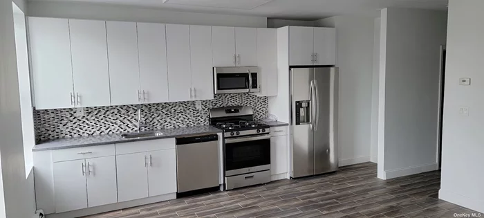 Spacious 3 Bedroom Apartment For Rent. This Renovated Apartment Features Beautiful Floors, Combo Kitchen with Stainless Steel Appliances, Lots of Natural Light , Lots of Windows. Steps Away From Shopping, Public Transportation, and Amenities.