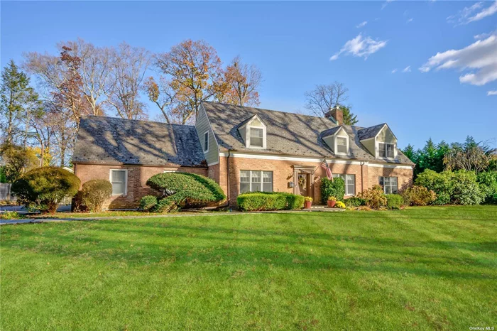 This welcoming colonial sits beautifully on a level .5 acre+ in the Glen Head community of North Shore Acres. This sought after location is surrounded by mature plantings and winding lanes. You will appreciate the pride of ownership at the entry foyer. This home is the perfect blend of classic details with a modern flair.The living room is a welcoming spot with wood burning fireplace, built in cabinetry and lots of natural light. With tons of counter space, the spacious custom kitchen is a cooks dream with 6 burner Wolf gas cooking and plenty of storage. A great room is conveniently located off the kitchen and offers views of the private backyard. Easy access to the 1st floor laundry room featuring custom built cabinetry. The first floor includes a bedroom or home office along with sitting room, full bath and powder room. The thoughtfully designed chic primary suite includes an impressive walk-in closet and luxurious bath. 2 additional bedrooms and full bath are also located on second floor. The backyard offers privacy and includes a 20x40 heated in-ground gunite pool, patio and room to play. Conveniently located in the Award winning North Shore SD.