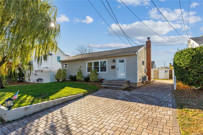 Welcome to this fully renovated ranch in a mid-block location with 3 bedrooms, 2 full baths, and a fully finished basement. Vaulted ceiling in the living/dining room, modern kitchen cabinets with quartz countertop, porcelain tiles, and stainless steel appliances. Gleaming hardwood floors, hi-hats, central air/ductless split units, and a gorgeous basement with 2 additional rooms and a kitchen with OSE. 200-amp electric panel, garage-sized shed in the backyard, in-ground sprinklers, M/D with proper permits. Low taxes, gas on the street. Bethpage schools, close to LIRR and shopping!!!