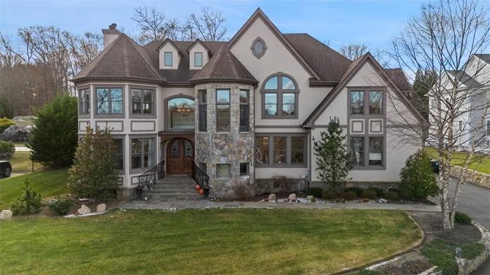 Welcome to this 5, 500+/- square foot builders own custom home. The 5 bedroom, 4.5 bathrooms(lives like a 6 bedroom with the Au Pair/In-law unit with a separate entrance) smart home is part of the very desirable Park Lane community of 299 luxury residences.  This home is located in a cul d sac, on .7 acres and is part of the of the award winning IB Harrison Central School District. Purchase elementary, LMK Middle, Harrison High schoolThis home was built in 2017, and the basement was completed in 2024, and features a very large living room area, private bedroom, home gym, full bathroom, billiard and gaming area.  This home features a stunning large slate patio with outdoor kitchen, patio set and living room area The professionally landscaped property is designed to maximize the beauty of the home.  There is also a bocce court and firepit area. Gourmet Kitchen with Sub-Zero & Wolf appliancesGranite & Marble Countertops throughout the house.