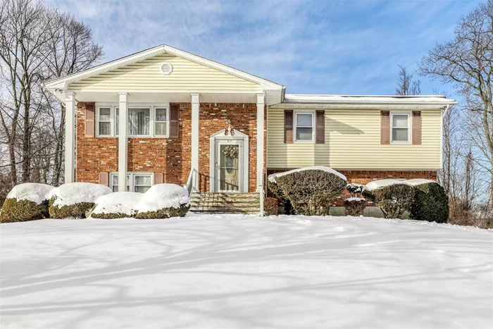 Welcome to this captivating raised ranch home in the heart of New City, nestled on a serene .62-acre lot of perfectly level land with over 2, 000 square feet of tastefully designed living space. Greeted by a newly updated exterior and brand-new front door, enter through elegant marble foyer leading to the open formal living room. Sunlit updated windows, bathe the living area and formal dining room with light, highlighting the intricate moldings, hi-hats and gleaming hardwood floors throughout. Enjoy cooking in the updated eat-in kitchen equipped with granite countertops, spacious center island, and all updated appliances. Convenient sliding doors from the kitchen and dining area, leading to a newly redone Trex deck - perfect for hosting inside/outside while overlooking the private, fully fenced backyard. Main bathroom is updated with built-ins and whirlpool tub.&#160; 3 spacious main floor bedrooms including primary suite with walk-in closet and private primary bath. Lower-level boast family room with smoldering brick-lined gas fireplace, built-in bookcase, and surround sound. Additional two bedrooms, one with sliding door walk-out to backyard. A convenient full bath along with laundry room/storage space complete the lower-level. This home boasts a wealth of updates and amenities, including a 2 car garage, newly updated doors throughout, updated windows throughout, new washer machine, updated water heater, new electric fireplace, new garage doors, baseboard heat (2 Zones), central air conditioning, solar panels, updated alarm system, and more. Donâ€™t miss the opportunity to make this stunning home your own!