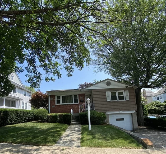 Newly renovated charming three bedroom home in the heart of Pelham. Walk to shops walk to train walk to all. Private backyard perfect for relaxing or entertaining. Central air, beautiful huge 2 car garage, and all new appliances.