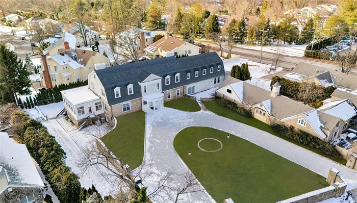 As you approach the sweeping circular driveway you&rsquo;re immediately drawn to the tasteful elegance of this stone colonial situated on .74 acres. The Belgium block detail, exterior stone wall and Vermont slate roof create a feeling of elegance and grandeur. Combining old world architectural details with special details and amenities create this exceptional residence. Amenities include NEW: high end kitchen, baths, electrical, Bosch HVAC, plumbing, windows, recessed lighting, custom moldings and copper gutters. The dramatic 10 ft entry leads to the large living room, sunroom, formal dining room, powder room, office, Chefâ€™s Kitchen with Viking appliances, large center island, quartz countertops, glass doors so you can see outside while sitting at the kitchen table, pantry, mudroom, ensuite bedroom and another bedroom with hall bath complete the first floor. The second floor has a sumptuous primary suite with red brick wall accent in the sitting area, 2 walk-in closets, 16 ft. high ceilings in sleeping area and luxurious bathroom, two ensuite bedrooms, another bedroom and a hall bath complete the second floor. The location is ideal; near shopping, schools, transportation. This home is truly special for the discerning buyer!