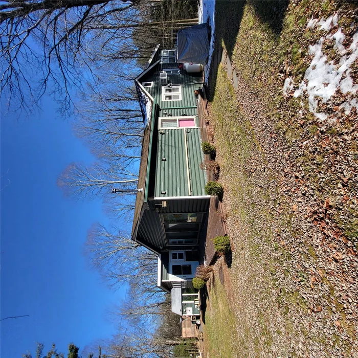 Welcome to your serene getaway in the lovely Smallwood, NY lake community! This charming rental home features 2 bedrooms and 1.5 bathrooms. The abundance of closet space ensures you&rsquo;ll have plenty of room to store all your belongings. Step into the inviting sunroom, bathed in natural light, where you can relax and take in the tranquil surroundings. The deck provides the perfect spot for outdoor entertaining or simply unwinding with a cup of coffee. For added convenience, there&rsquo;s an outdoor shower, ideal for rinsing off after a day at the lake.Inside, you&rsquo;ll find a cozy atmosphere with a wood-burning stove to keep you warm during the cooler months. The home also includes a washer and dryer, making laundry a breeze. This home offers comfort and tranquility in a picturesque lake community. There is a dog park, 100 acre hiking trails and outdoor workout facility that is free to all residents in Smallwood. There is a heated pool and clubhouse for an extra fee as well as a Restaurant/Pub. Close to Bethel Woods, restaurants, gas and shopping.