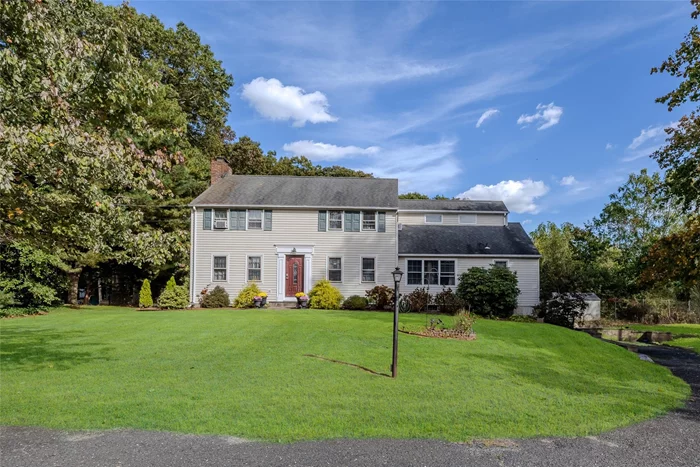 Magnificent Colonial home captures the essence of timeless beauty. This charming farmhouse style home welcomes you with a large horseshoe driveway, elegant trim and exterior shutters. This large 1 acre property is bordered partially by town land and mature trees. As you step inside, the home reveals its classic Colonial charm with knotty hardwood floors and large windows that flood the interior with natural light. The heart of the home is the expansive living room, perfect for entertaining or enjoying quiet moments by the wood burning fireplace. The formal dining room flows seamlessly into an updated chef-inspired kitchen, complete with custom cabinetry, one gas range, one electric oven, granite countertops and a beautiful stainless hood. Nurture your plants and herbs from the extended sun filled window by the kitchen sink. Located off of the kitchen is a large pantry perfect for plenty of sourdough starter and a storage room to design the Mudd room of your dreams! Upstairs 3 generous bedrooms with ample closet space. The primary suite features an ensuite bathroom with jetted tub, large shower stall, double vanity. An upstairs bonus room can serve as a potential 4th bedroom or expand the ensuite. The backyard offers a ton of privacy all while being minutes from sunrise highway and Sayville&rsquo;s main street. Don&rsquo;t miss this opportunity to call this house your home.