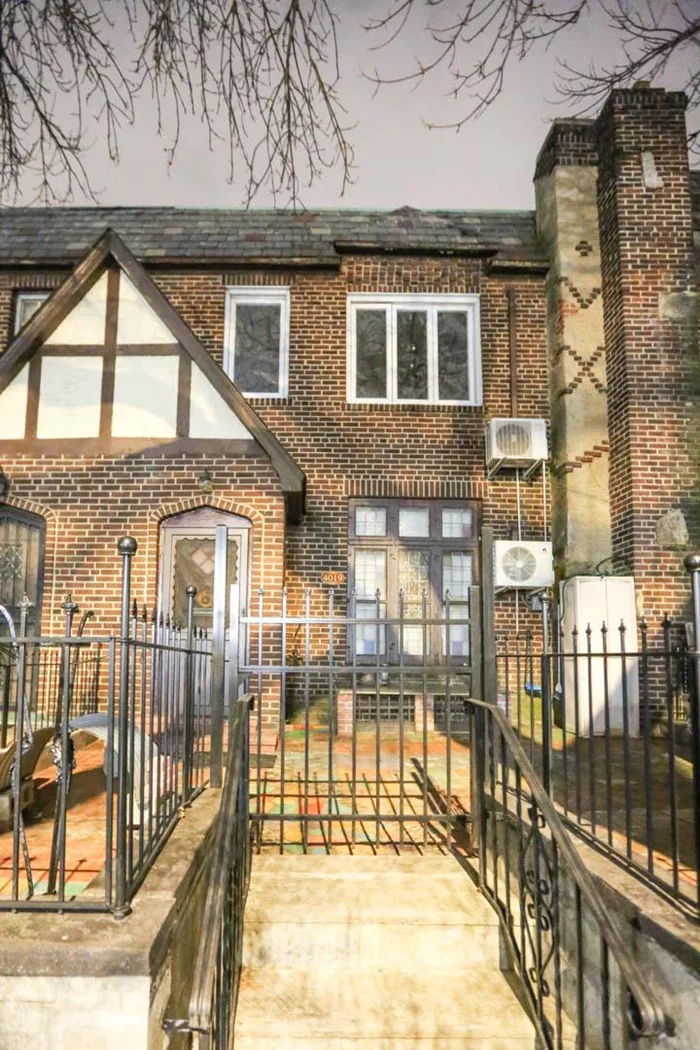 Modern updated English Tudor, high ceilings, attached garage. Private rear entrance with finished basement. Close and convenient to all.