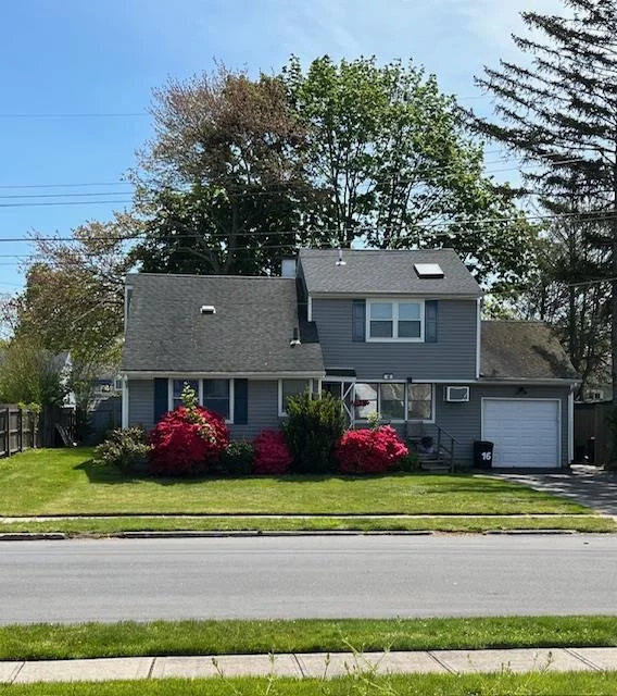 Location, Location!!Beautiful Sunset City area, just 1-1/2 blocks from Belmont Lake Park. House Has 3-1/2 levels, 5 Bedrooms, 2-1/2 Baths. Needs some updating and work, but excellent bones and possibilities.