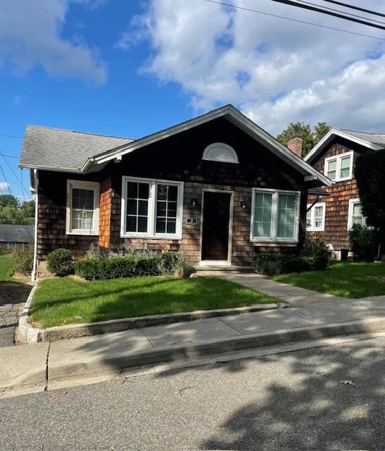 Come see this beautifully renovated cottage. Enclosed porch,  New kitchen with stainless steel appliances. Wood floors, new bathroom. Full finished basement with washer/dryer and central air and back yard patio.