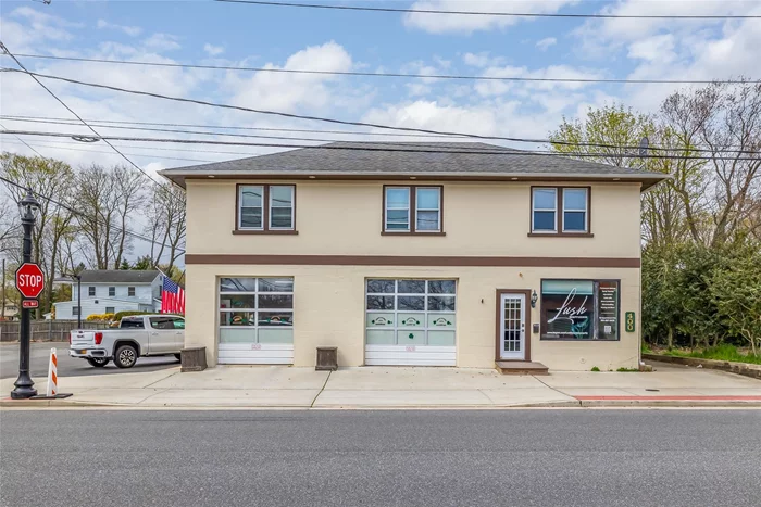 Mixed Use building containing 4, 500 square feet commercial space on the ground floor which includes an Existing Auto Body Shop and Beauty Supply Store on the ground floor with multiple working areas and office space. The second floor consists of two one-bedroom updated apartments with lots of sunlight throughout, approximately, 1, 630 +/- square feet of residential space on the second floor. Additional parking room/lot for the autobody part of the building. Contact agents for more information.