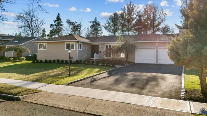 Presenting this beautiful gut renovated expanded RANCH home with JERICHO schools. It has a total of 4400 ft of living space, which allows for flexible living, or multigenerational living if there is a need. It is also situated on one of the largest pieces of land, allowing for a private backyard w/ sprinkler system. The Open Floor Plan leads to a stunning great room with a 2 story stone fireplace, & exposed ceiling beams with white shiplap walls. There are walls of glass, showcasing gleaming wood floors & bright light filled rooms. Everything is brand new - kitchen, appliances, bathrooms, 5 inch white oak wood floors, & HVAC systems. There are 4 bedrooms and 2.5 bathrooms. An outside entrance leadsto the downstairs which has the possibility of 2 bedrooms, den,  laundry room w/ new washer/dryer, full bath and a cedar closet. Best location on Ivy Drive, surrounded by multimillion $ homes. Convenient to shopping highway and LIRR, yet on a private street. Must be seen too much to list.