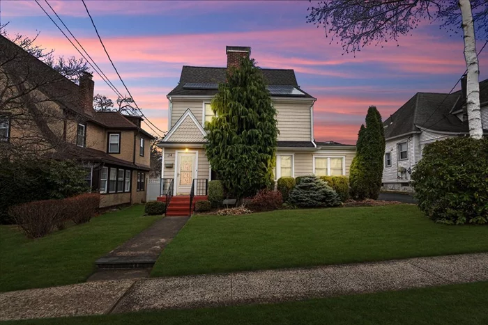 This stunning Colonial home offers a perfect blend of timeless elegance and modern comfort. Nestled on a serene, tree-lined street,  it features a cozy living room with a welcoming fireplace, perfect for relaxation. Enjoy outdoor living at its finest with a private patio, ideal for barbecues and entertaining. It&rsquo;s approximately 1/2 mile from the white plains train station.With its own garage, it offers the ultimate convenience. Beautifully landscaped with Japanese maple, birch tree and evergreen trees. Don&rsquo;t miss the opportunity to make this exquisite property your own!