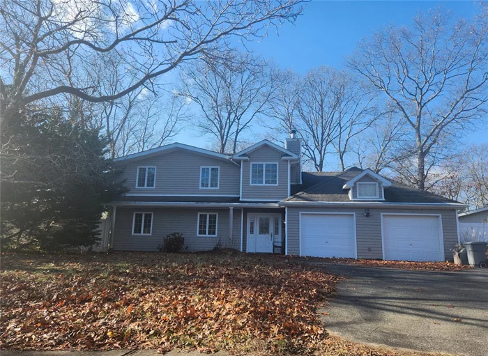 Welcome to 19 Horseshoe Lane, an expansive sanctuary in the heart of Commack. This inviting four-bedroom, three-full-bath Colonial home boasts a spacious living room/dining room, an eat-in kitchen, a den/family room, and an extra-large bonus room. With French sliders that open to a generous yard and above-ground pool, this residence beautifully blends style and comfort in an exceptional location, ready to inspire your dream lifestyle. Commack school disctrict. Taxes listed are without STAR deduction.