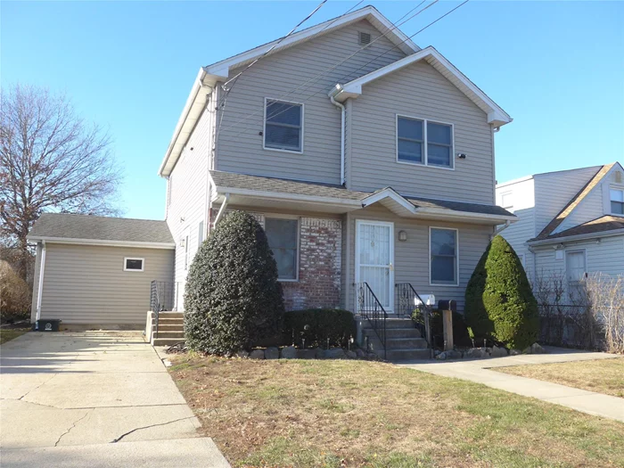 The first floor of a duplex with 2/3 bedrooms and 2 full baths in the renowned Carle Place Schools. It has easy access to LIRR, stores, and highways. Landlord pays for water and handles landscaping. The tenant is responsible for utilities and snow removal. Tenant has use of yard and basement