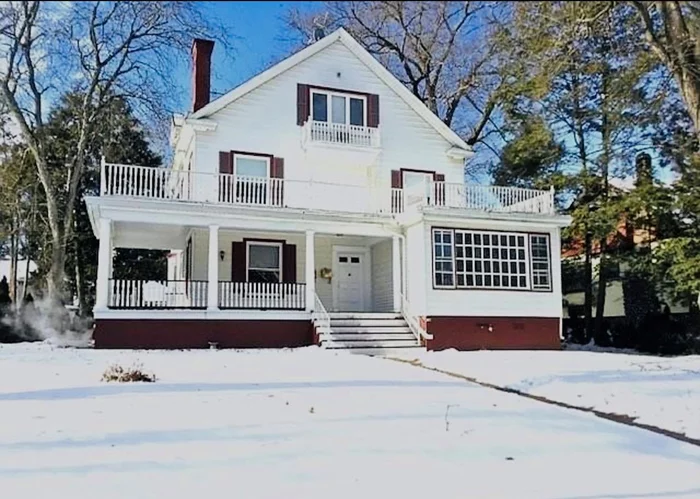 Discover the timeless charm of this 1915 Colonial on Poughkeepsieâ€™s desirable Southside, perfect for investors or owner-occupants. With a professional suite ideal for doctors, lawyers, or remote professionals, this property blends home and work seamlessly.This spacious home features refinished hardwood floors, a new high-efficiency gas furnace, and oversized bedrooms, including a grand primary suite. The formal dining room, library, and family room add versatility and charm, while the wrap-around porch invites outdoor relaxation.The paved lot accommodates up to 14 cars, making it ideal for professional use. This move-in-ready home offers endless opportunities.