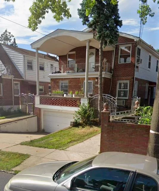 Beautiful Over sized legal 2 family house in the Heart of Briarwood, comes wit 8 bedrooms and 4 bathrooms. Brick House with over sized lot, Closed to F train Subway and Other Public Transportation. 2 Car Garage and lot&rsquo;s of potentiality.