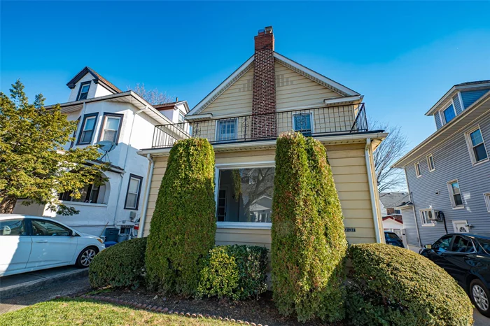 Flushing beautiful location! This sweet freshly painted colonial is clean with large rooms, 2 year old hot water heater, nice backyard with a 2 car garage! Hardwood floors were recently polished and look amazing! Mid-block location, newer roof and siding. Come on in and fall in love!