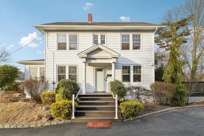 Historic Charming Colonial in Patchogue,  this Beautiful home features Craftmans style molding throughout, gleaming hardwood floors, updated 3 bedrooms, 1.5 bathroom, formal dining room with Coffered ceilings and chair rail,  living room with cozy fire place, off of the living room is a heated sun porch,  Newly renovated Eat in Kitchen with stainless steel appliances, half bathroom off kitchen, large deck for entertaining.  Second floor consists of three bedrooms walk in closet, gleaming hardwood floors, and hallway closet,  and full bath, Third Floor is a finished bonus room can be used for office, playroom, craft room,  Close to theatre, shopping, restaurants, and the train station. This home is move in ready and ideal for buyers seeking a combination of historic charm and modern updates in the Vibrant Patchogue Neighborhood!!