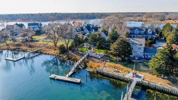 Experience the beauty of this stunning newly constructed waterfront home perfectly situated on Meeting House Creek. With its large oversized dock and deep water access, this home is a boater&rsquo;s dream. Step inside to discover a spacious interior boasting 3 bedrooms, 3 full bathrooms, and a versatile flex room that can be used as an en-suite bedroom or additional living space on the main level. The open concept great room features a chef&rsquo;s kitchen, dining area, and living room, creating the ideal space for entertaining. Upstairs, find two guest bedrooms, including one with a water-side balcony, a full bathroom, and a truly impressive master bedroom with an en-suite bathroom and water-side balcony. Outside, the rear yard offers a large stone patio, fire-pit, and a red brick walk-way that leads to the home&rsquo;s impressive deepwater dock. Located on Overlook Dr, a private road that juts out into the bay, you&rsquo;ll enjoy fantastic water access to the Great Peconic Bay and all it has to offer.