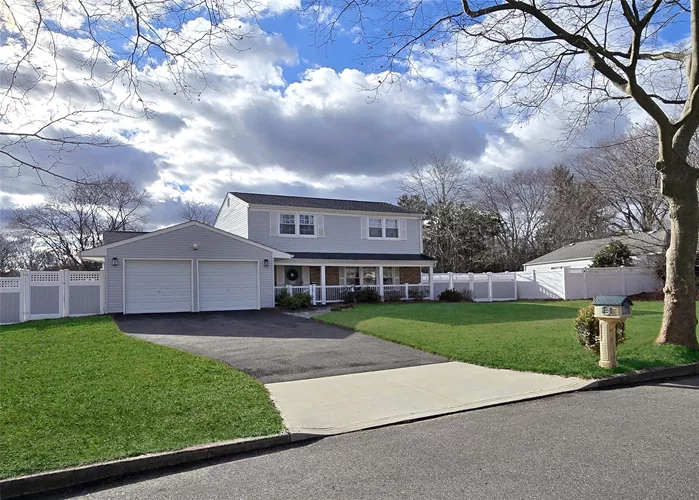 Move-in ready Colonial with 4-5 bedrooms and 3 newer baths. The kitchen features a brand-new refrigerator, an updated oven, tile backsplash, and recessed lighting. The den can serve as a potential 4th bedroom, and the third upstairs room can easily be converted as well. Enjoy the updated engineered wood flooring, washer, and dryer. Additional highlights include a 10-year-old central air system, updated windows, a 5-year-old roof and siding, and PVC fencing installed 5 years ago. Relax on one of the 3 brick patios.