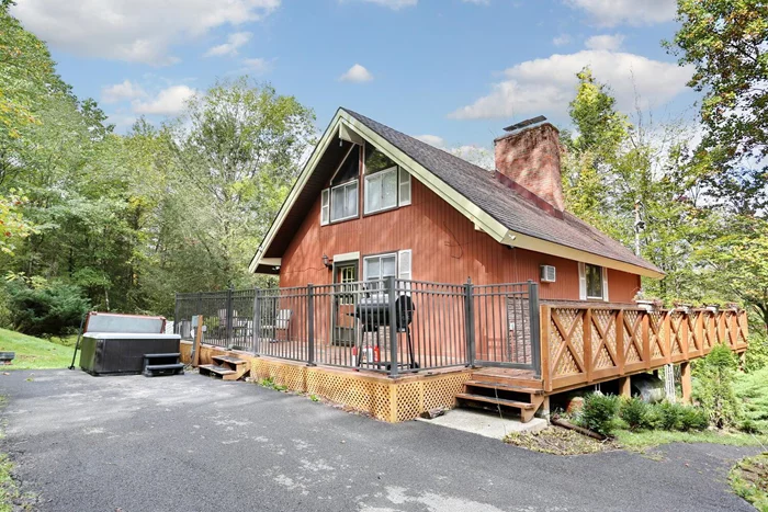 A-Frame home in the town of Wallkill within the Minisink School District. The home is nestled amidst 1.2 acres of serene woodland and offers lots of natural lighting, vaulted ceilings, along with charm and privacy. A large wrap-around deck hugs the perimeter of the home, providing ample space for outdoor relaxation, entertaining, and soaking in the sights and sounds of nature. Inside enjoy the rustic beauty with breathtaking views of the floor-to-ceiling windows. The updated kitchen and bath in 2023 give it a modern touch. Other modern conveniences are smart thermostats and well water filtration system. A three season sun room with floor to ceiling windows adds to the charm of this house along with a bedroom on the main floor. Heading upstairs to the primary bedroom, you&rsquo;ll discover exposed wooden beams providing a comfortable and relaxing space. On the bottom level you will find a living area with an additional fireplace. A bedroom on the lower level, laundry area and walk-out provides a perfect private space. Outside, explore with winding paths leading through the woods and opportunities for outdoor recreation with the above ground pool just steps from your door and a shed that provides your outdoor storage. Potential for purchase of the furniture. In addition, the property is currently being used as a successful AirBnB providing extra income. Schedule your showing today! Additional Information: HeatingFuel:Oil Above Ground,