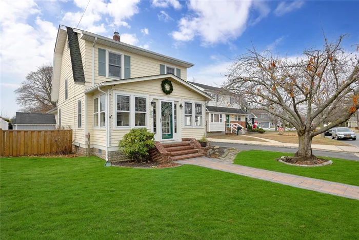 Magnificent, large Dutch Colonial situated on quite mid-block, Inc. Village, great curb appeal w/clapboard, cedar shake ext., leaders & gutters, new brick paver walkway, brick stoop & steps, new blacktop driveway w/Belgium blocks, this home has all the charm of yesteryear, completely remodeled, Encl. Front Porch w/9 windows, wainscoting ceiling, original old fashioned moldings & woodwork, ceiling fan, large LR w/hickory h/w floors, FDR w/hickory h/w floors & ceiling fan, newer ext. large EIK w/granite countertops, subway tile backsplash, maple cabinets, vaulted ceiling, skylight, hi hats, s/s appliances, farm sink & reclaimed barn wood wall, laminate flooring, rear ext. breathtaking, large Family Rm/Great Rm w/vaulted ceiling, gas fireplace w/mantle, ceiling fan & hi hats, updated Fbth w/granite sink-top, oak medicine cabinet & vanity & vaulted ceiling, 2nd Flr 2 staircases, 3 BRS all w/new wall-to-wall carpeting, 1 w/ceiling fan, Fbth w/wainscoting & pedestal sink, large walk-up Attic, Basement partially finished Family Rm, Laundry Rm w/washer & dryer, Workshop, Utility Rm, plaster walls, glass door knobs, newly painted interior, all windows have been replaced except for Porch, w/tilt easy clean windows, gas heat, sep. h/w heater, 2 zone heat, 100 amp electric, roof approx. 13 years old stripped to sheathing, security cameras, convenient to transportation, shopping & railroad.