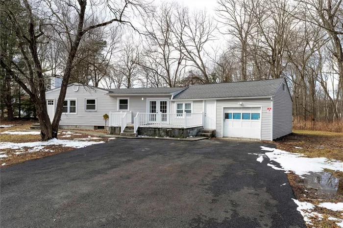 Welcome to this beautifully renovated ranch in Hopewell Junction. The home features an open-concept main level with three spacious bedrooms and two full bathrooms, all enhanced by abundant natural light. The finished basement offers versatile space, perfect for recreation or a potential in-law suite. Significant updates include a new oil tank with housing, a completely new septic system, a repaired foundation, and an expanded back deck. Throughout the home, refinished hardwood floors and fresh paint provide a modern and inviting atmosphere. Nestled in a serene neighborhood, this home offers both tranquility and convenience. Don&rsquo;t miss the opportunity to own this thoughtfully renovated ranch in the heart of Hopewell Junction. Schedule your showing today!