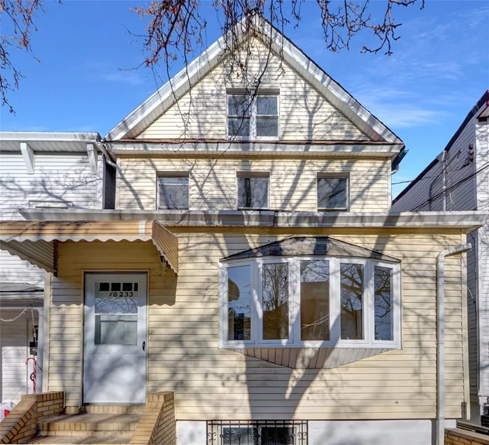 This Colonial Style Home Features 5 Bedrooms, 3 Full Baths, Kitchen & 2 Car Garage.