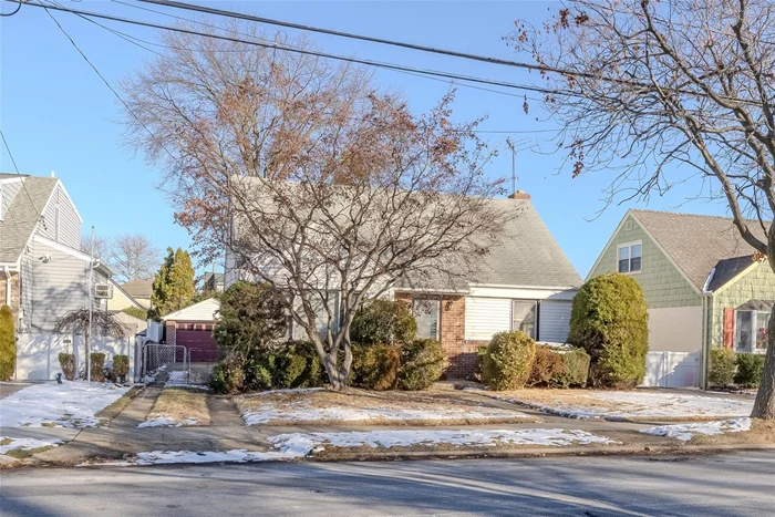 Original owner expanded cape with 4 beds/2 baths in a perfect mid-block location just steps from Jericho Turnpike, shopping and more. Full basement, natural gas in street, detached garage with parking for several cars in the driveway. Needs work. This home is being sold as-is.