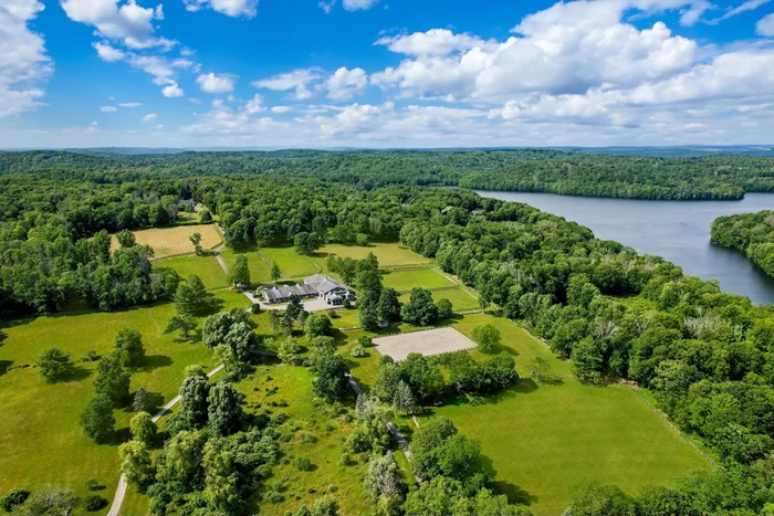 Birdstone Farm is one of Westchester&rsquo;s most stunning equestrian properties, spanning 54 acres of picturesque green pastures, lush lawns and a serene pond. The long, gated driveway ensures privacy off a quiet country road. This premier equestrian facility boasts a state-of-the-art 20-stall barn with an attached indoor riding ring, perfect for year-round training and an outdoor sand ring with a viewing stand. The property includes a charming 3-bedroom cottage, a groomâ€™s apartment, expansive paddocks and two run-in sheds. The farmâ€™s proximity to the 4, 700-acre Pound Ridge Reservation is a true highlight, offering endless opportunities for recreational horseback riding and hiking along scenic trails. This exceptional property combines natural beauty with top-notch equestrian facilities, making it a dream come true for horse enthusiasts.