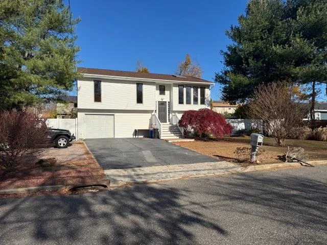 Nicely Maintained Five Bedroom, Three Bath High Ranch in a Lovely Kings Park Neighborhood. Close to Schools, Shopping, Parks and Entertainment Venues. Kitchen with Ceramic Tile, Quartz Counter Tops. Hardwood Floors throughout. Huge Rear Deck off Kitchen and Large Patio off of den. Vegetable/Flower Garden Beds and Storage Sheds, as well as Concrete Basketball/Recreation Pad located in spacious back yard.