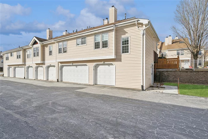 Lovely three-bedroom, two-bath, townhouse with attached one car garage in the sought-after Whispering Hills Community of Chester. This second floor end unit has an inviting woodburning fireplace & vaulted ceiling. The sliding door off the living rm leads to a private deck. The pretty navy & light blue kitchen is adjacent to the dining area & includes granite countertops, black appliances & pantry. The spacious primary bedrm has a walk-in closet organizer & tastefully updated bathrm with dual sinks & tiled shower area. The two additional bedrooms are well proportioned & the main hall bath has been updated.  Private laundry with washer & dryer included. Newer vinyl windows, Trane central air, gas heating system & public services. Bonus - inquire about the Community Solar Array option! Amenities include: outdoor pool, fitness center, tennis & basketball courts, playground, & rec center. Commuter bus stops in the complex to NYC, plus easy access to shops, dining & all major highways.