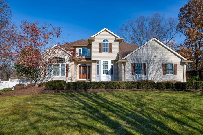 One of the most beautifully designed Deer Crossing homes, this elegant colonial sits on 5.6 acres. Two story, oak floored entrance foyer features a dramatic staircase. The perfect work from home office is off the front hall and has French doors for privacy. The library, with a wall of floor to ceiling built-in book shelves, large Palladian window and high ceilings, is a room you&rsquo;ll definitely want to spend time in! Another set of French doors leads to a formal dining room with chair rail and crown molding. Eat in kitchen features include granite countertop, large island, corner windows above sink, two wall ovens, sliders out to deck plus a walk in pantry. Step down into formal living room with wood burning fireplace and plenty of natural light. Powder room and laundry room finish the first floor. Two car garage is accessed off of the laundry room. Spacious primary suite has two walk in closets and a bath with jetted tub and separate stall shower. Second floor has an additional three bedrooms and full bath. Front bedroom has vaulted ceiling and Palladian window. Large basement is partially finished with French doors out to a magical garden with gazebo and Koi pond. The fenced back yard is home to a stunning pool area. The concrete pool is surrounded by a two tier blue stone and paver patio, with tall grasses, pergola, and a pool house. Great for entertaining!