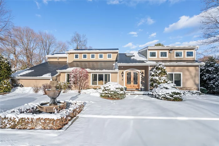 Proudly presenting this ultra luxury builderâ€™s own colonial for the discerning Buyer. Located in a beautiful cul-de-sac in North Syosset, this home was built with no expenses spared! Featuring integrated smart home technology throughout, the drop dead gorgeous 6 bedroom 5.5 bathroom home is fully upgraded for the modern buyer. With 9 foot ceilings on the downstairs as well as the upstairs, this home offers flexible living spaces, which are perfect for multigenerational living or for an in-home professional office. The downstairs 2 bedroom, 1 bath suite could accommodate professionals such as Doctors, Dentists, Architects, etc. depending on the need. Additionally, there are two primary en suite bedrooms, one located on the upstairs, as well as one on the first floor. The home has radiant, heated floors throughout the first floor, as well as the second floor. With walls of glass, and gleaming Hardwood Floors, the home is airy, bright, and filled with light. The designer kitchen showcases custom cabinets, and High End appliances such as Subzero and Viking. The one of a kind country club backyard features a sparkling blue pool, with a professional golf putting green and a tennis court.  Some of the recent upgrades include Tesla, solar panels, Tesla, power wall, Crestron Smart Home System, whole house, gas generator, EV charging stations, bathroom upgrades, new pool automated cover and equipment, brand new sprinkler system, top-of-the-line security system, home theater, and Toto toilets throughout. There is too much to list!!! Some of the recent upgrades include Tesla, solar panels, Tesla, battery, collectors, top of the line Crestron smart home system ($100, 000 cost). The location is unmatched, offering perfect privacy, yet two minutes from the LIRR, five minutes from major roadways, easy access to shopping, and close to schools, and parks, this home offers everything!