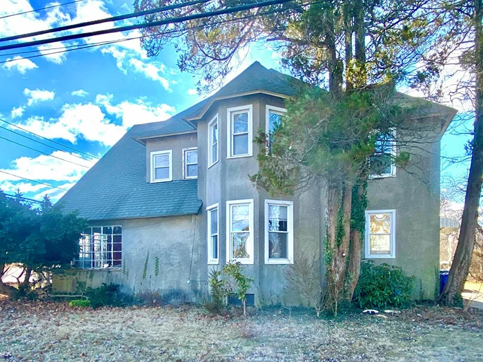 Old World Charm In The Heart Of The Village! This Large Home Features: Sun Room, Entry Hall, 4 Bedrooms, 2 Kitchens, 2 Full Baths, Formal Dining Room, Full Basement With Interior And Exterior Entrance, Full Walk Up Attic And Detached 2 Car Garage, All Located On Oversized Property That Is Just Over A Half Acre Measuring 132 X 148. The Home&rsquo;s Original Architectural Details Remain Intact. With Some TLC This House Can Be Transformed Into The Home Of Your Dreams. The Roof Is 7 Years New, Most Windows, The Gas Burner And HW Heater Are 10 Years New. Possible Mother/Daughter With Proper Permits. Conveniently Located, Just Steps To The Shops On Main Street And Few Blocks To Port Jefferson Train Station. Close To Port Jefferson - Bridgeport Ferry, North Shore Beaches And Parks. The Taxes Stated In This Listing Include 1, 035.21 Village Tax And Do Not Include Any Deductions Such As STAR