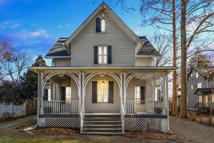 Village living awaits!!! Tucked into the heart of historic Rhinebeck, this enchanting 18th century home is a masterpiece of charm and tranquility. Just one block from the lively village center, it offers seamless access to farmersâ€™ markets, boutiques, fine dining, Dutchess County Fairgrounds and community eventsâ€”all while being enveloped in the peace of its lush, picturesque gardens.The homeâ€™s gingerbread trim, rocking chair front porch, and beautifully preserved architectural details welcome you inside, where sunlight dances across wide-board floors, high ceilings, and alcove windows. The gracious first floor features a foyer, dining room, living room, family room and half bath. At the heart of the home, the chefâ€™s kitchen opens to a serene back porch. Here, mornings begin with coffee in the golden sunlight, and afternoons fade into conversations in the shade. A few steps down, a stone patio and a spacious backyard filled with perennial flowers, shrubs and fruit trees, invite you to host lively gatherings or escape into quiet reflection.The second level, accessible via front and back staircases, features a primary suite with a dressing room or office, two guest bedrooms, and another full bath. Beneath the carpets lie 8-inch wide plank floors, waiting to be revealed. The walk up attic offers untapped potential for additional living or storage space.Meticulously cared for, the home includes a newer roof with a lifetime guarantee (2016),  updated HVAC (2019), and a recently installed septic system (2021). With ample parking, room for a pool, and space for gardening and games, this rare property is both a retreat and a gateway to the Hudson Valley. Only 5 minutes from Amtrak in Rhinecliff and 25 minutes to Metro North in Poughkeepsie, itâ€™s an easy escape for weekend getaways or fulltime village living. Donâ€™t miss this rare opportunity to own a piece of history!