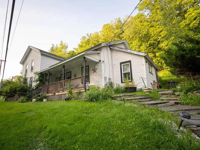 Great investment property situated on 1.1 acres. This two unit home features 2 bedrooms and 2 full baths on the right side while the left side has two bedrooms and one full bath. The right side of the house is currently used as a airbnb. The unit to the left has been completely renovated with an updated bathroom and kitchen. The front porch has new decking and railings. The main floor was recently painted and updated full bathroom. The kitchen has new floors painted cabinet. Large bedroom upstairs with walk-in closet, a second bedroom, and additional sitting area. Newer windows have recently been installed and new water heater and well tank. New installed small pond in the backyard up the hill. Very close to town. Close to Neversink and Rondout Reservoir and state land for hunting. Kartrite Water Park, Holiday Mountain and Minnewaska State Park nearby and only two hours from NYC. Additional Information: HeatingFuel:Oil Above Ground, ParkingFeatures:2 Car Attached,