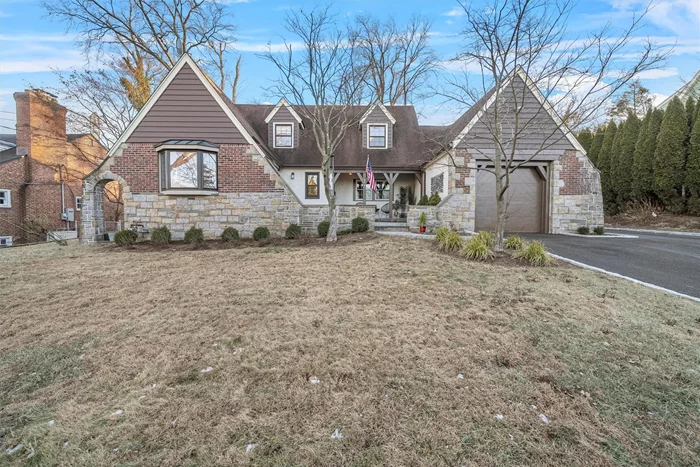 Welcome to this stunning Cape Cod, Tudor-esque style home that perfectly blends classic charm with modern updates. Nestled in the desirable Orchard Hill section of Elmsford, this meticulously maintained property boasts 4 spacious bedrooms and 2 full bathrooms, making it an ideal retreat. Enter through the charming front stone patio, step inside and be greeted by beautifully refinished hardwood floors that flow through the main living areas, creating a warm and inviting atmosphere. Your first floor living features an expansive living room equipped with a whitewashed stone fireplace. The eat-in kitchen features a newer Samsung & Bosch appliances and flows effortlessly into the dining area, complete with bow windows. The versatile sunroom, featuring skylights, offers an excellent space for a home office or a cozy reading nook, bringing the beauty of natural light indoors. The home includes a full unfinished basement, providing ample storage or potential for additional living space. Outside, enjoy the fenced yard, providing privacy and perfect for entertaining. Recent updates have enhanced the homeâ€™s functionality and appeal, including a new furnace (2021), mini-split ductless cooling & heating (2018), and front/back patio (2019) â€“ ideal for outdoor gatherings. The driveway was completely redone in 2023 including Belgium block borders, ensuring plenty of parking and curb appeal. Come and visit this gem before it is gone!