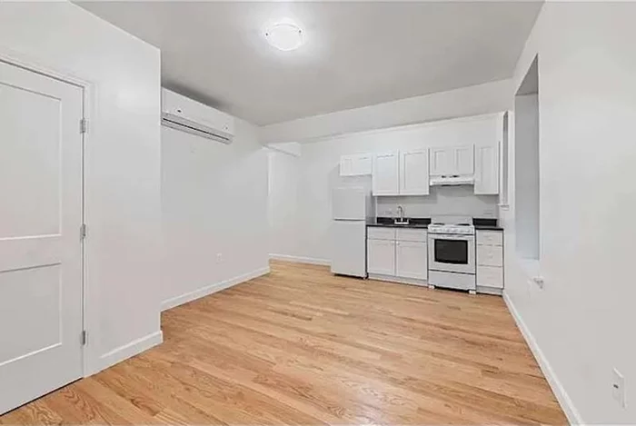 Welcome to Unit B4 at 39-21 57th Street in Woodside, a newly renovated studio alcove apartment that combines modern updates with a prime location. This second-floor walkup unit features all-new kitchen appliances, beautiful hardwood floors throughout, and a fully renovated bathroom with a tub/shower combo.The thoughtfully designed alcove bedroom provides added privacy and separates your sleeping area from the main living space, offering a unique and spacious feel for a studio apartment.Conveniently located in the heart of Woodside, this apartment is close to essential amenities and transportation options. It is just steps away from the Woodside Community School, local parks, and recreational areas. Commuting is a breeze with easy access to the LIRR station, as well as multiple subway lines.Experience the perfect blend of comfort and convenience in this beautifully updated studio. Schedule a viewing today to make this apartment your new home!