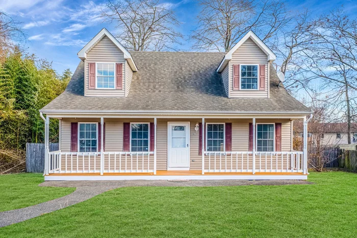 Newly renovated cape in south Mastic Beach! Enter into a spacious living room flooded with natural light. The living room flows right into the dining room with a slider to the backyard. Brand new kitchen with quartz countertops, shaker cabinetry, and stylish black stainless steel appliances. Large first floor primary with full bath directly across the hall. 2 large bedrooms upstairs & a brand new hall bath. This house sits high on the property with a covered front porch and fully fenced yard. Oil heat, first floor laundry, & brand new vinyl flooring throughout. Calling all boat and beach lovers! A third of a mile to Marina One and access to the Great South Bay. 7 Minute drive to Smiths Point Beach. Move right in and enjoy South Shore living!