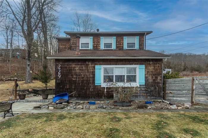 Discover the perfect blend of modern upgrades and rustic charm at 229 Skidmore Road! This enchanting property has been thoughtfully updated to offer both comfort and sustainability. Step inside to find a cozy living space enhanced by a brand new wood-burning stove, perfect for those chilly Hudson Valley evenings. The home is equipped with a new oil tank, ensuring efficient heating throughout the seasons. For peace of mind, a sump pump with a backup battery is installed, providing extra protection against the elements. This home is also future-ready with an EV charging station, making it ideal for environmentally conscious homeowners. Enjoy pristine water quality with a full house filtration system and a constant pressure water system that ensures a steady flow, no matter the demand. The interior boasts beautiful hardwood floors and large windows that invite natural light, creating a warm and inviting atmosphere. Make this your sanctuary and enjoy a lifestyle of comfort and convenience!