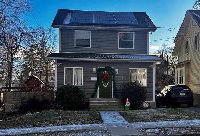 Nestled in an idyllic neighborhood within Newburgh&rsquo;s historic district, this charming 3-bedroom, 1.5-bathroom home exudes warmth and invites you in with its sunlit rooms and enclosed entry porch. The open living room features a brand new picture window and built-ins that maximize space, flowing seamlessly into an ample-sized dining room off the kitchen. Situated on an oversized lot, the property boasts a fenced-in backyard and additional side space, perfect for outdoor entertaining and play. A standout feature is the owned solar panel system, offering significant savings on monthly utility bills. Ideally located near a library, elementary school, and Mount St. Mary College. Commuters will appreciate the easy access to Route 84 and 87, while leisure seekers can enjoy nearby parks and waterfront dining options. This delightful property truly offers the best of both worlds â€“ historic charm and modern convenience â€“ making it an attractive option for those seeking a comfortable and well-situated home.