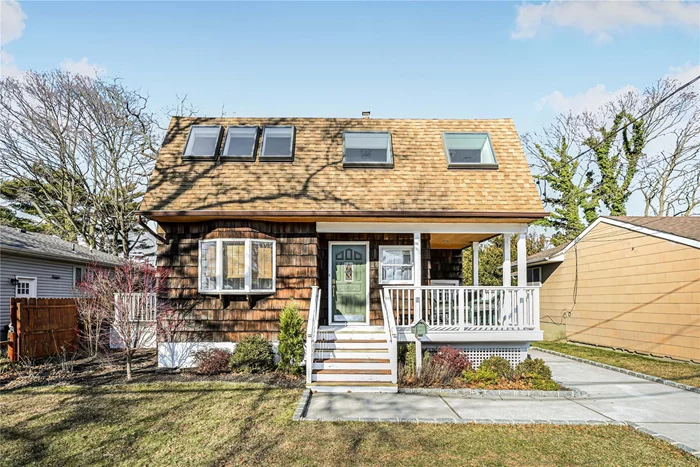 Charming Unique Colonial with a Welcoming Porch. This Sunlit Home offers an open floor plan featuring newly installed flooring throughout. The first floor bedroom has sliders to a rear deck. This area can also be used for an office. There is a full laundry room on the first floor also. There is a spacious primary bedroom on the second floor with a sitting area. The room adjacent to the primary can be used as a nursery or you can create a space that suits your lifestyle needs, perhaps a dressing room, a walk in closet even a small office. The additional 2 bedrooms are also generous in size with each bedroom offering ample closet space. If you enjoy sitting outside you can relax on the front porch, the side deck or the rear deck. The choice is yours!