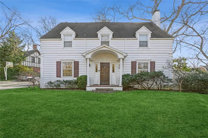 Step into this timeless colonial-style home, featuring five bedrooms and four and a half baths. The elegant design include an expansive rat in kitchen a formal living room, a dining room, and a cozy den with views of the spacious backyard. Nestled in the prestigious back area of Lawrence, this home sits on over an acre of beautifully landscaped property, complete with a stunning pool and low taxes.