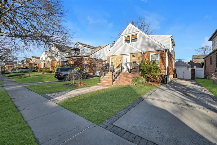 Beautiful Detached Brick One Family House In Excellent Condition ! 4 Bedrooms, 2.5 Baths + Finished Basement. One Car Garage. 26x38 Building Size & 40x100 Property. Mid-Block On Quiet Tree-Lined Street. Convenient To All Shopping, Transportation Q27 Bus To Flushing. Great Flow Of Entertaining. Exceptional Opportunity ! Best School Dist#26. Walk to Ps203 & Cardozo H.S. Prime Bayside Location ! Must See This Home ! Will not last !