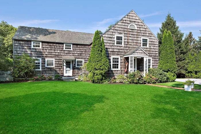 QUOGUE SOUTH RENTALHidden away down a leafy driveway, this lovely shingle-style 4 BR, 4.5 BA is just a short distance to everything in Quogue. The first floor features an enormous wood-beamed great room with fireplace; eat-in kitchen; laundry room; den; and 1.5 baths. Upstairs is a primary suite with walk-in closet and renovated bath; two twin bedrooms; one queen bedroom, and 2 full guest baths. Outside is a detached garage, spacious back yard, and heated pool. Available now - June 2025.