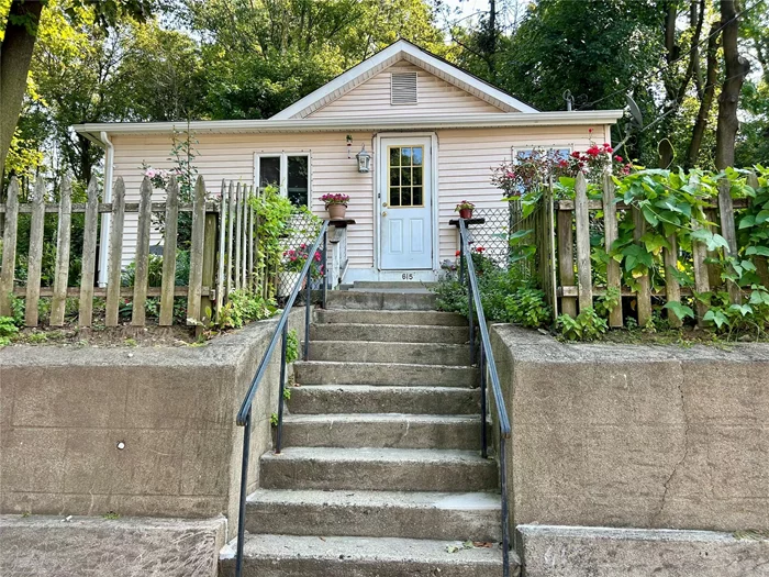 Adorable and Affordable 2 bedroom, 1 bath bungalow in the heart of Peekskill. This one level ranch has some added privacy up on a little hill. Room for a small garden and back yard patio. Perfect for someone who wants little yard maintenance and some private outdoor space. This property is an estate and sold as is. Showings are by appointment only.