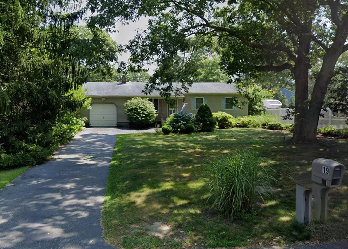 Discover the potential of this 3-bedroom, 1-bathroom home located in the heart of Shirley, NY. Offering a spacious kitchen with propane cooking, living room, and dining room with a breezeway leading to the backyard, this property provides a solid foundation for your vision. Central Air System.The home also features a full basement with walk-out access and a 1-car garage, sitting on a level quarter-acre lot. Conveniently located in the William Floyd School District, itâ€™s close to parkways, shopping, and the train station, making commuting and errands a breeze.