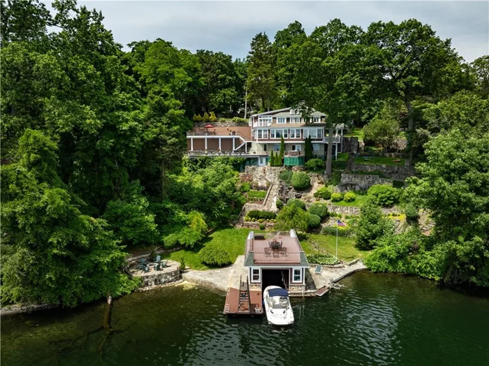 Welcome home to this Beautiful Adirondack styled retreat, with stunning panoramic views of Lake Mahopac, just one hour to NYC. Live your best life in this lakefront home with almost 190 feet of your own shoreline. This lovely 4500sqft, three level home includes incredible lakefront amenities - Boathouse, Cantilevered dock, Jet-ski lift, Firepit, Inground pool, Hot tub, Italian style outdoor kitchen with fireplace, Waterfall, Decks, Porches and so much more. Enjoy all of these special features, which are beautifully positioned with breathtaking views of the lake. The perfect blend of luxury, comfort and natural beauty! The home also has a naturally bright and sunny open floor plan which allows for stunning lakefront views. Entertain from your chef&rsquo;s kitchen that easily sets the stage for a progressive dinner party from the multiple entertaining spaces. Both indoors and outdoors provide wonderful experiences for unforgettable memories for every generation of family and friends. With an abundance of well-placed mature trees, stone walls and perennials, this property feels very private, like a dream come true! There are two separate garages, in addition to spacious parking options. Lake Mahopac is a 583-acre motorboat lake, close to golf, lakefront dining, shopping and nearby train station - Croton Falls. Easy access to the Taconic State Parkway and for all that the Hudson Valley has to offer! Additional Information: Amenities:Pedestal Sink, Soaking Tub, Storage, HeatingFuel:Oil Above Ground, ParkingFeatures:1 Car Detached, 2 Car Detached,