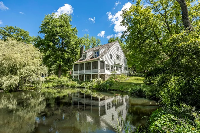 SUMMER RENTAL â€“ Available July through Labor Day at $40, 000 per month. Quintessential c.1765 country estate in a peaceful and private setting. Escape to the countryside and spend the summer lounging by the heated gunite pool, dining al fresco on the bluestone patio, roasting marshmallows around the firepit, exploring the numerous trails throughout the 154 acres and fishing in the pond. This expansive 6, 743 square foot main house offers five/six bedrooms and six baths. The home is beautifully furnished and has a timeless charm with the numerous fireplaces, wide board floors, beamed ceilings and built-in bookcases. There is a top of the line kitchen with sunroom, family room, den with fireplace, library, formal dining room and office. Adding to the list of amenities is a screened porch overlooking the stream and pond, movie theater, ping pong room, mudroom with dog wash and gym. The two-car garage includes an electric car charger. There is an additional studio/pool house with kitchenette. Enjoy peace and tranquility on this estate while being conveniently located between the charming villages of Rhinebeck and Millbrook. Dogs allowed upon approval. References and credit check required.